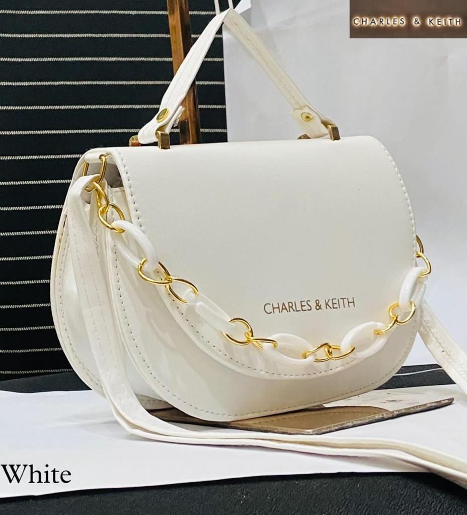 Circular Elegance: Round Shape Sling Bag with Plastic Design Chain